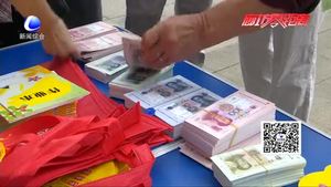 我市各銀行在市區(qū)集中開展反假幣宣傳活動